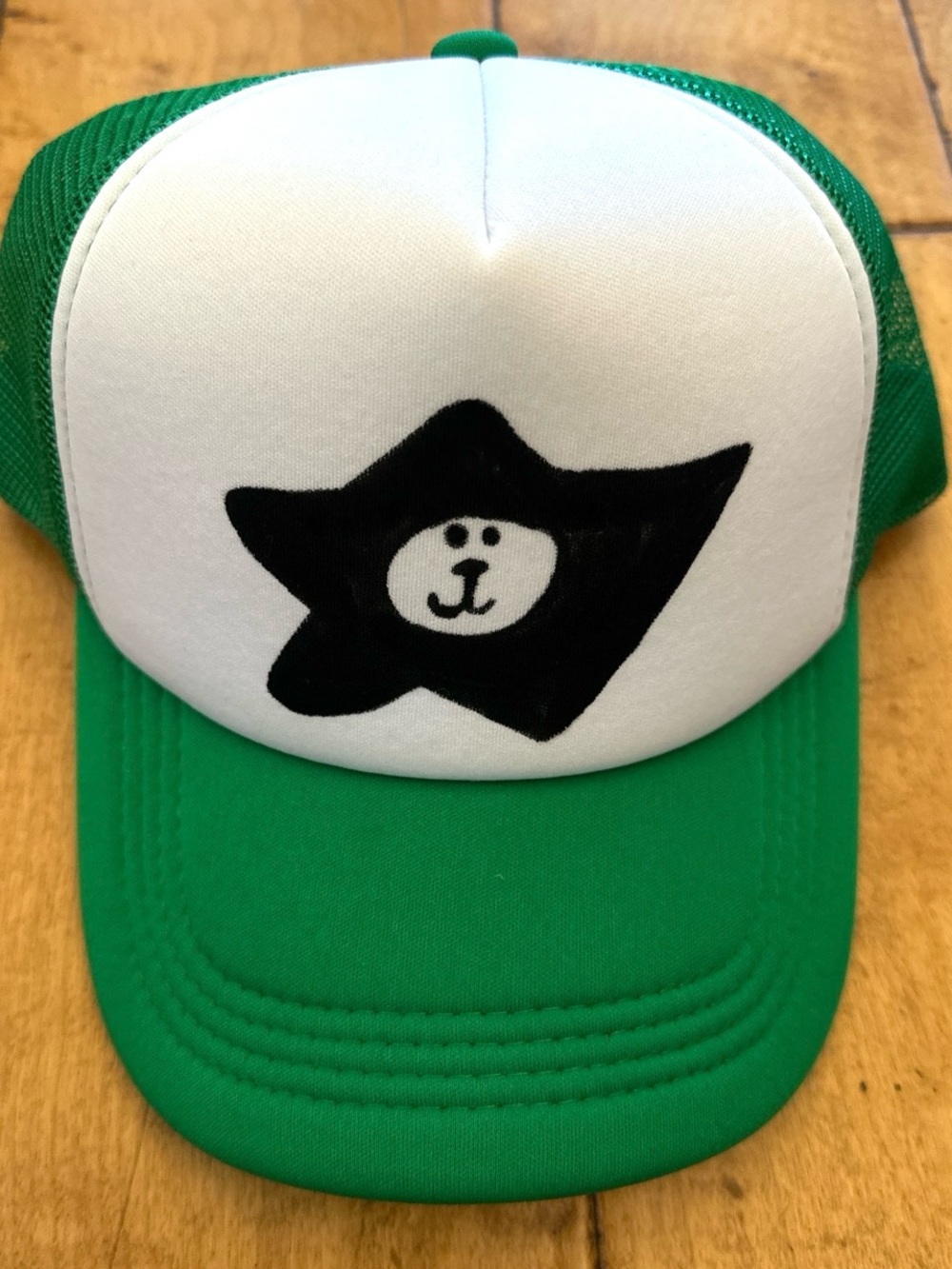 Green and White Trucker Hat with Black Star Dawg Surf Patch
